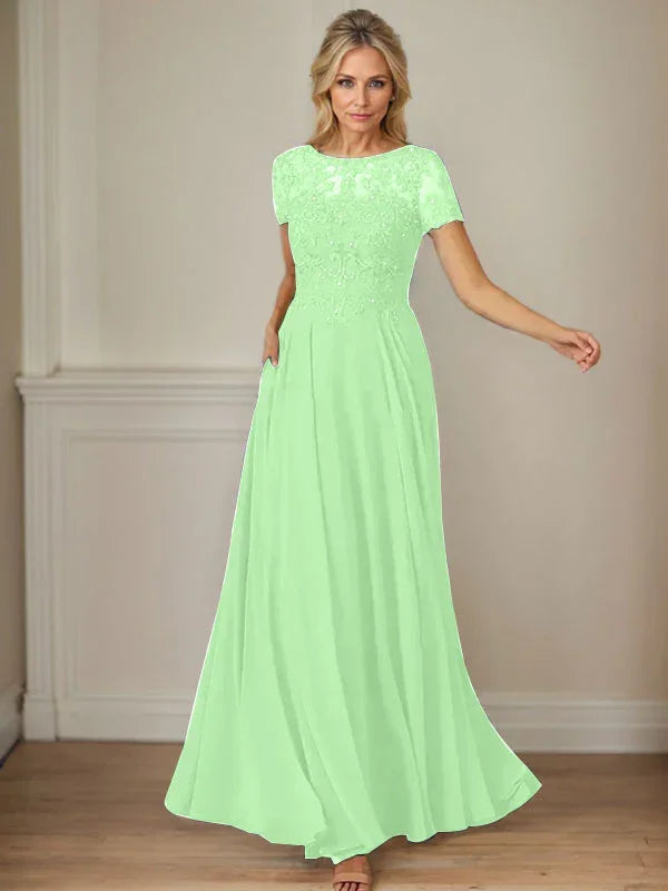 فستان شيفون كحلي داكن برقبة قارب وتطريز بالترتر على شكل حرف A