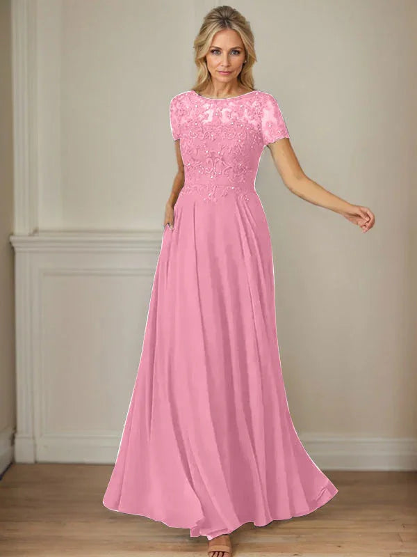 فستان شيفون كحلي داكن برقبة قارب وتطريز بالترتر على شكل حرف A