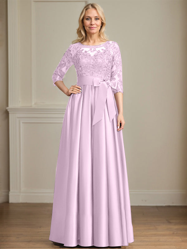 Robe de mère de la mariée en satin et dentelle, longueur au sol, coupe trapèze, décolleté illusion en forme de goutte, avec nœud à paillettes