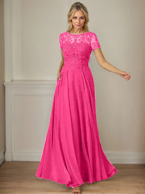 فستان شيفون كحلي داكن برقبة قارب وتطريز بالترتر على شكل حرف A