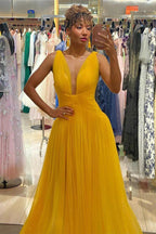 Abito da sera giallo in tulle con scollo profondo SYP154
