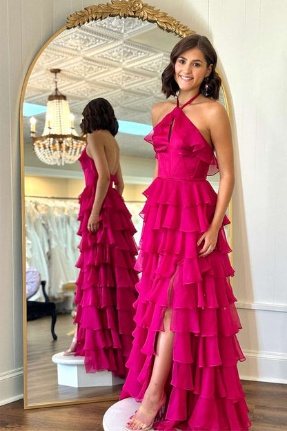 Hermoso vestido de fiesta largo fucsia con volantes y cuello halter