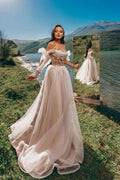 Abito da sera romantico con spalle scoperte, gonna a balze in tulle, stile principessa da giardino