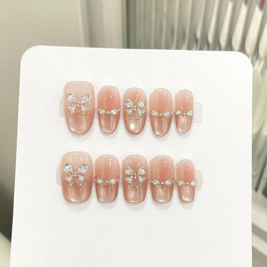 10 uñas postizas con diseño de ojos de gato y diamantes de imitación, de larga duración, seguras e impermeables, ideales para ir de compras, viajar y citas. 