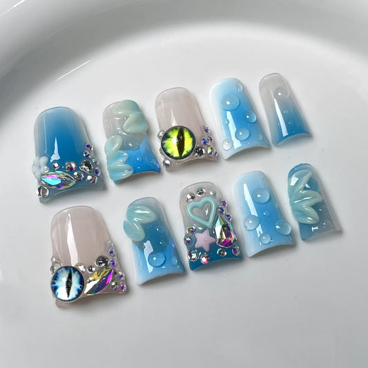 10 uñas postizas de verano en azul degradado, brillantes, con diseño de ojo de gato, flores 3D, brillantes, con diamantes, hechas a mano. 