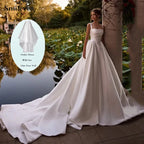 Custom Satin A Line Wedding Dress With Spaghetti Strap And Boat Neck