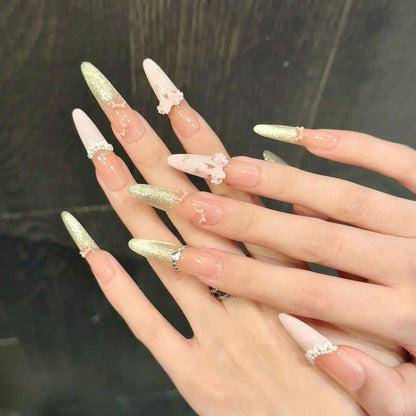 10 uñas postizas de ojo de gato doradas brillantes, con dobladillo de perla francesa, color rosa melocotón, hechas a mano, con lazo y almendra larga. 