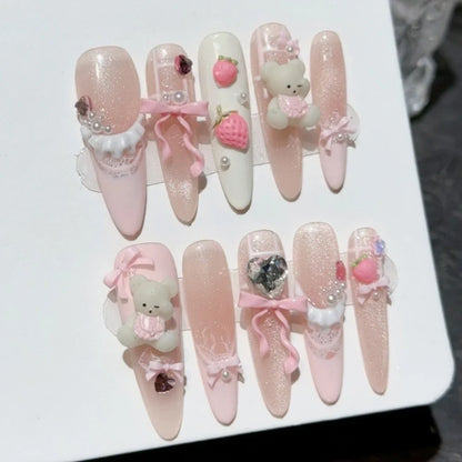 10 uñas postizas de ojo de gato doradas brillantes, con dobladillo de perla francesa, color rosa melocotón, hechas a mano, con lazo y almendra larga. 