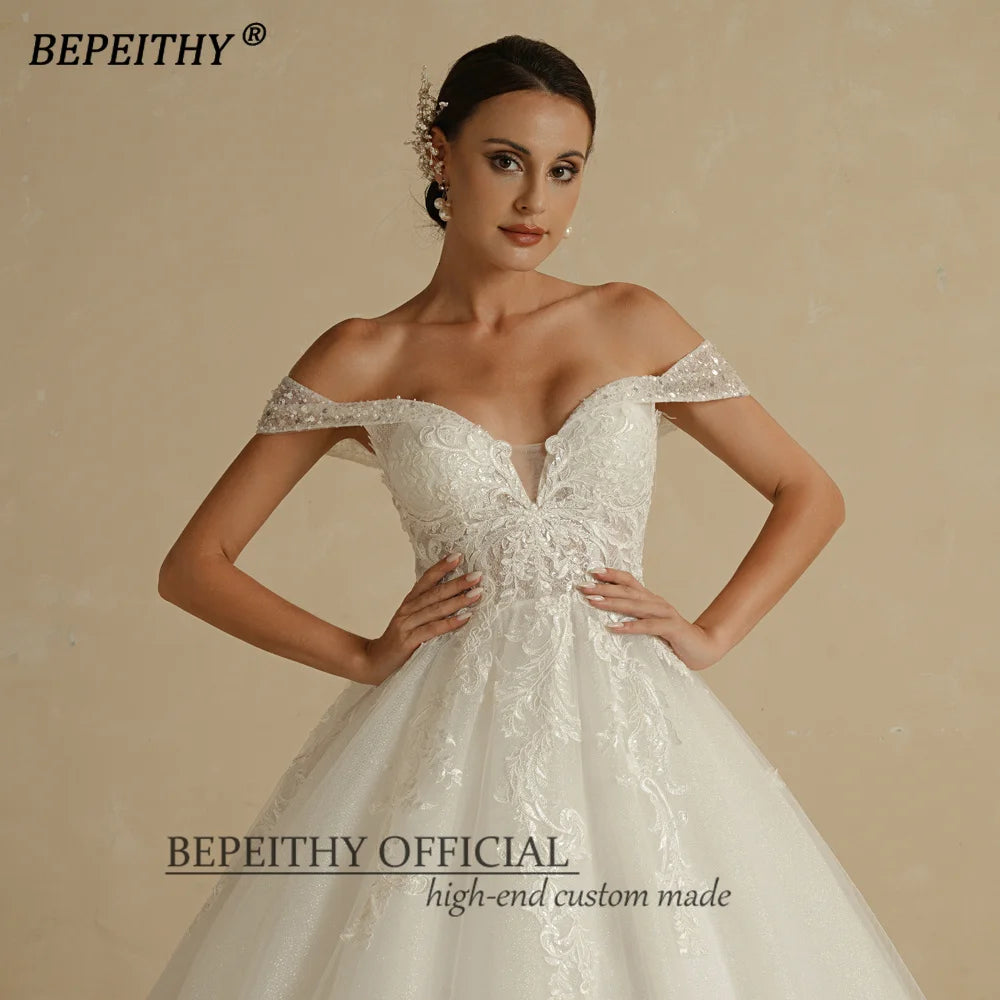 Bepeithy Customized Ivory Glitter Wedding Dress Sleeveless Bridal Ball Gown