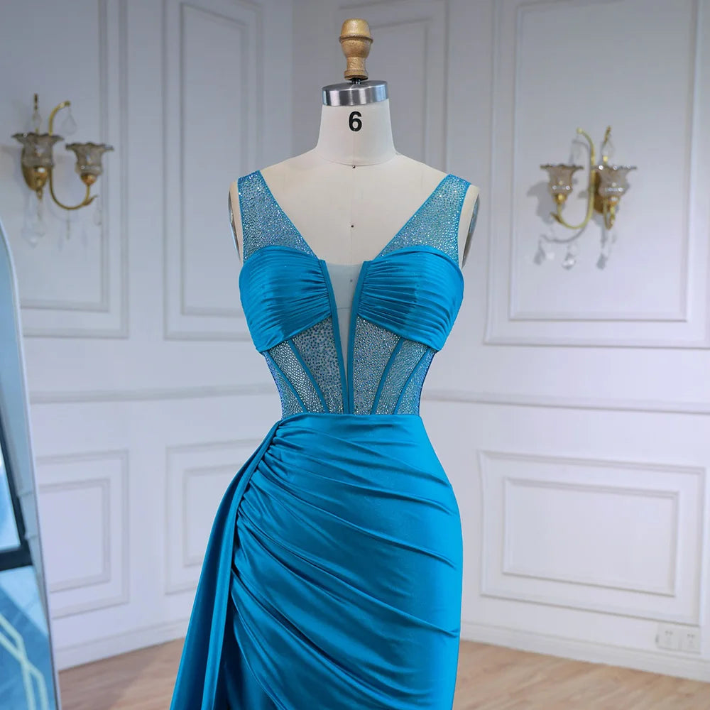 Blaues Abschlussballkleid mit seitlichem Überrock und Spaghettiträgern LA73011