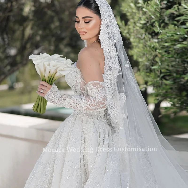 Mocaca Sequin Lace Applique Off Shoulder Long Sleeve Ball Gown Wedding Dress