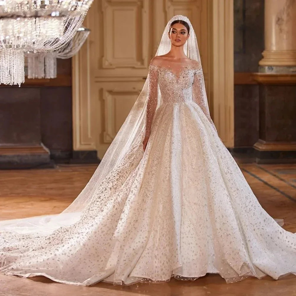 Luxury Long Sleeve Beaded Tulle Ball Gown Wedding Dress Button Back