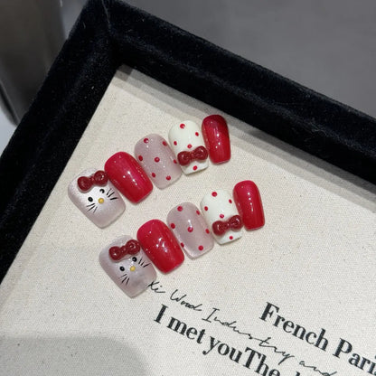 10 uñas postizas cortas de escalera hechas a mano, pintadas a mano, con diseño de gato dulce, color rubor francés y lazos rosas estéreo. 