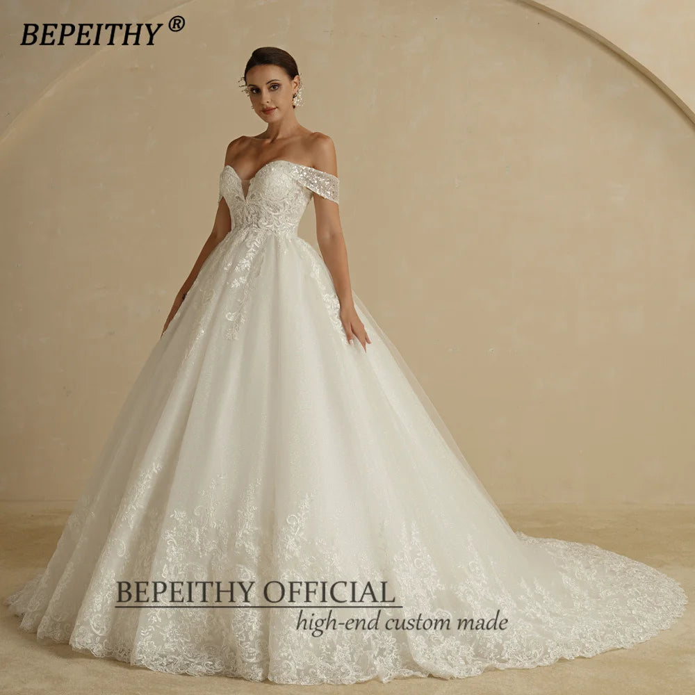 Bepeithy Customized Ivory Glitter Wedding Dress Sleeveless Bridal Ball Gown