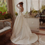 Custom A Line Long Sleeve Backless Bridal Wedding Dress With Lace Bow Detail