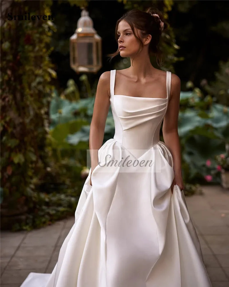 Custom Satin A Line Wedding Dress With Spaghetti Strap And Boat Neck