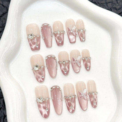 10 uñas postizas hechas a mano con diseño de mariposa de cristal, brillantes y decorativas, estilo francés, con diseño de ojo de gato rosa dulce. 