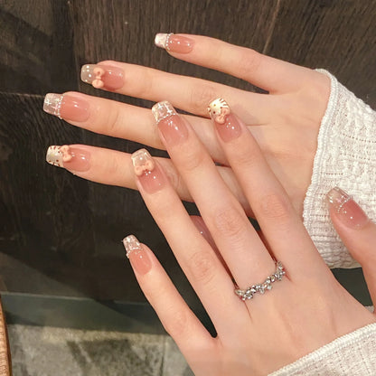 10 uñas postizas cortas de escalera hechas a mano, pintadas a mano, con diseño de gato dulce, color rubor francés y lazos rosas estéreo. 