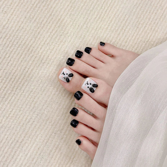 10 uñas postizas de cachorro pintadas a mano, cortas, cuadradas, negras y blancas, con diseño creativo y adhesivo. 