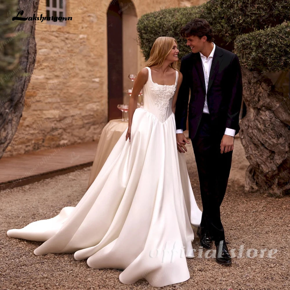Satin Wedding Dress Spaghetti Straps Appliques Draped A Line Bridal Gown