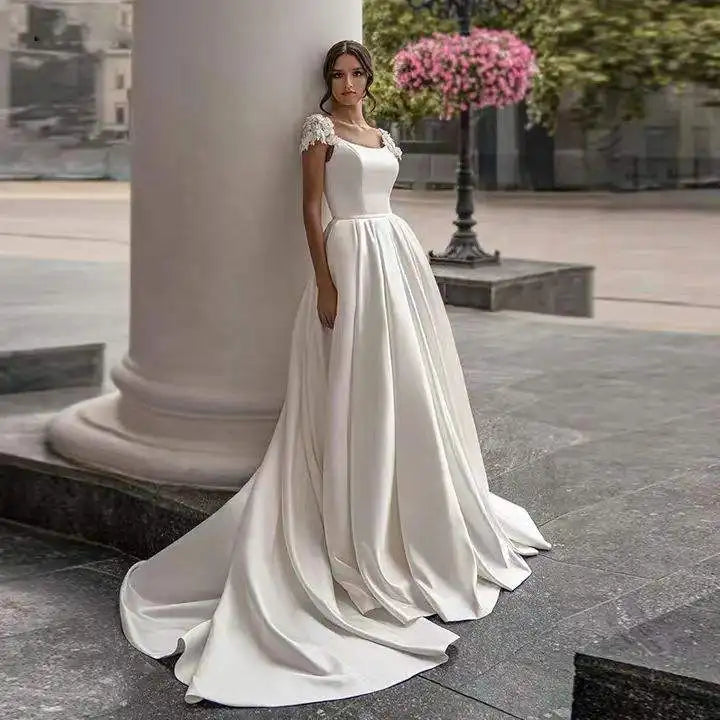 Custom Satin A Line Trailing Wedding Dress With Short Sleeves And Appliques