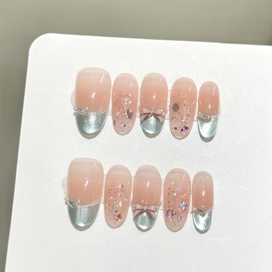 10 uñas postizas con lentejuelas brillantes, estilo ojo de gato, almendra dulce, estilo coreano, con lazos y decoración de perlas, color verde menta, estilo francés. 