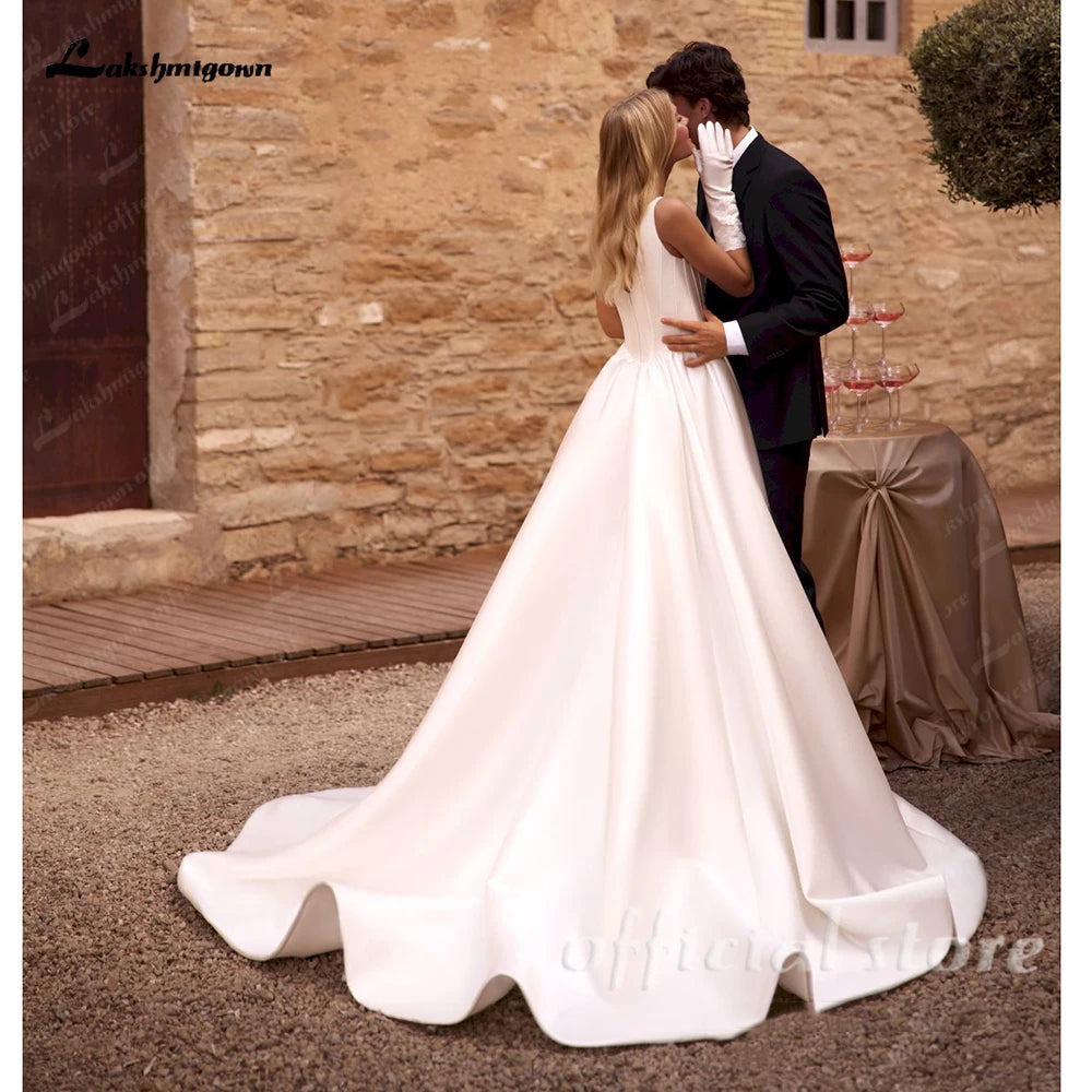 Satin Wedding Dress Spaghetti Straps Appliques Draped A Line Bridal Gown