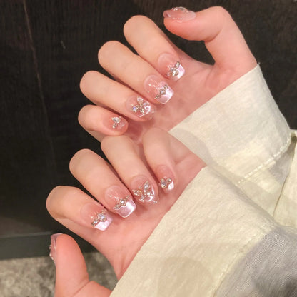 10 uñas postizas de estilo francés, color rosa fantasía, brillantes, con diseño de mariposa y diamante, hechas a mano, estilo coreano. 