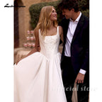 Satin Wedding Dress Spaghetti Straps Appliques Draped A Line Bridal Gown
