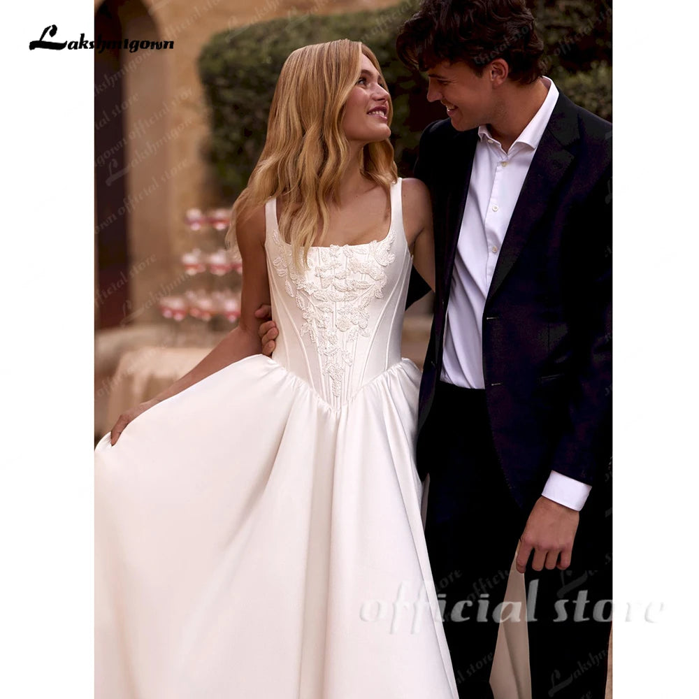 Satin Wedding Dress Spaghetti Straps Appliques Draped A Line Bridal Gown