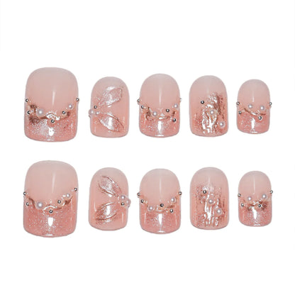 10 uñas postizas cortas y redondas, hechas a mano, estilo francés, color rosa, con diseño de ojo de gato y diamantes de imitación de perla. 