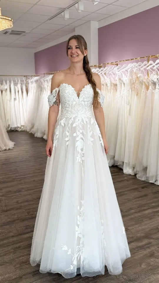 Custom Off Shoulder Wedding Gown With Lace Appliques And Cap Sleeve