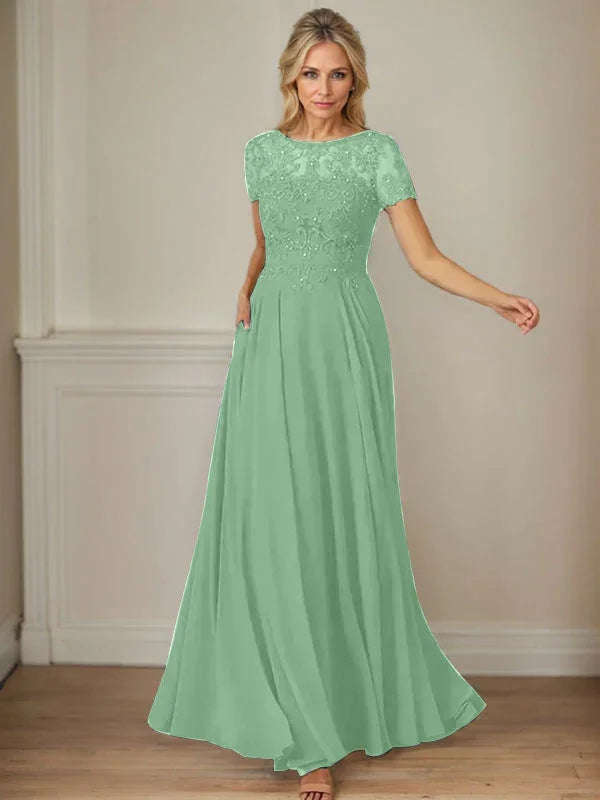 فستان شيفون كحلي داكن برقبة قارب وتطريز بالترتر على شكل حرف A