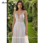 Customized Boho Bridal Gown With V Neck Lace Applique And Spaghetti Straps