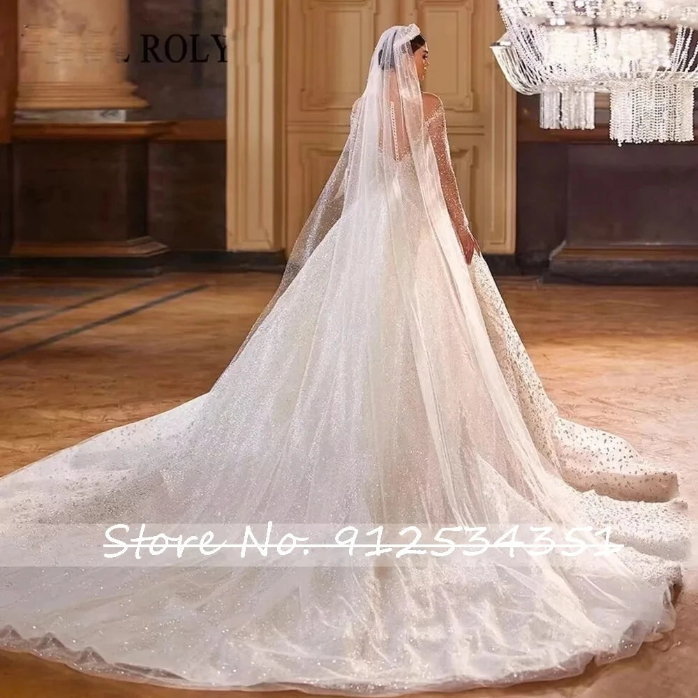 Luxury Long Sleeve Beaded Tulle Ball Gown Wedding Dress Button Back