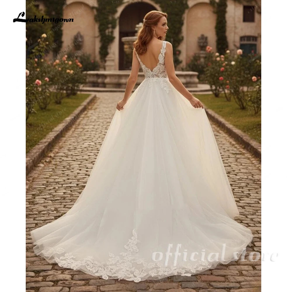 Customized A Line Tulle Wedding Dress With Open Back And Appliques