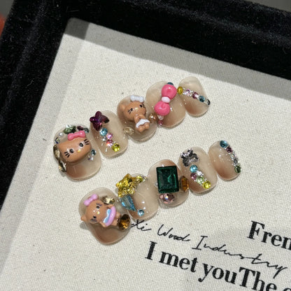 10 uñas postizas cortas de escalera hechas a mano, pintadas a mano, con diseño de gato dulce, color rubor francés y lazos rosas estéreo. 