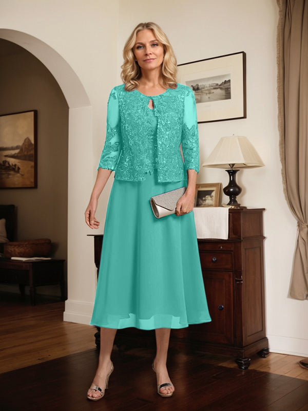 Robe de mère de la mariée en dentelle et mousseline, longueur thé, en ligne A, décolleté arrondi, ornée de paillettes