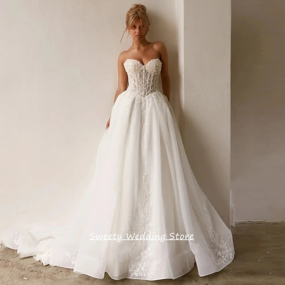 Custom Sleeveless Sweetheart A Line Wedding Dress With Lace Applique Train