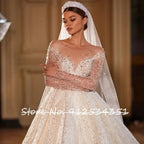 Luxury Long Sleeve Beaded Tulle Ball Gown Wedding Dress Button Back