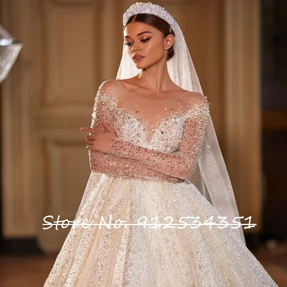 Luxury Long Sleeve Beaded Tulle Ball Gown Wedding Dress Button Back