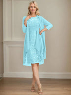 Abito da madre della sposa in pizzo e chiffon con gonna a colonna a effetto illusion fino al ginocchio, con balze a cascata e paillettes