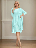 Abito da madre della sposa in pizzo e chiffon con gonna a colonna a effetto illusion fino al ginocchio, con balze a cascata e paillettes