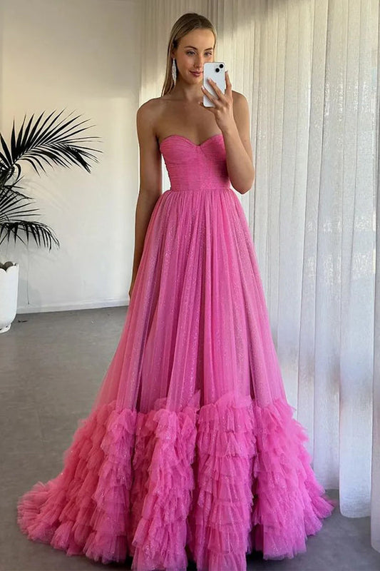 Vestido de fiesta largo fucsia de tul con volantes y corsé sin tirantes