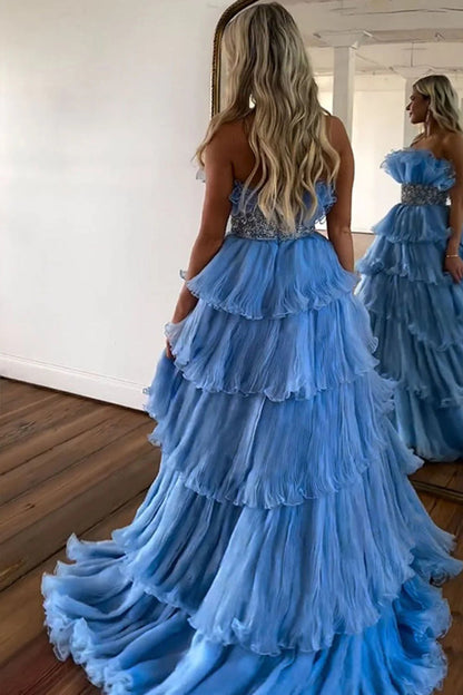 Elegante vestido de fiesta azul sin tirantes, corte A, largo, escalonado y con cinturón PSK483