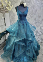 Abito lungo da sera blu lucente con scollo a V, applicazioni in tulle e paillettes, spalline sottili Y8051