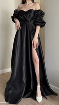 Elegante abito da sera lungo nero con scollo a cuore e spalle scoperte, linea a trapezio, maniche a sbuffo e spacco Y8283