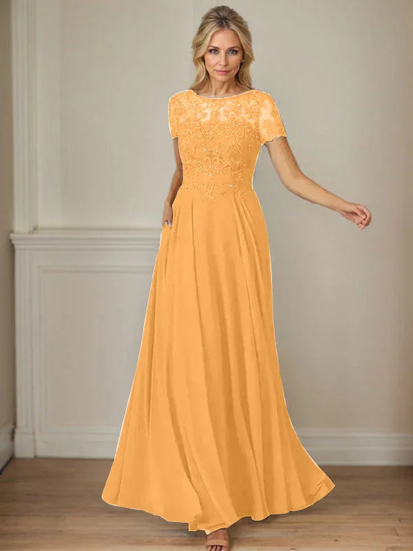 فستان شيفون كحلي داكن برقبة قارب وتطريز بالترتر على شكل حرف A