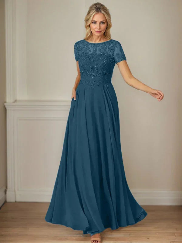 فستان شيفون كحلي داكن برقبة قارب وتطريز بالترتر على شكل حرف A