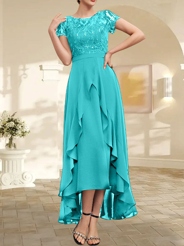 Robe de mère de la mariée en mousseline et dentelle asymétrique illusion à encolure dégagée, coupe en A, avec nœud, volants et paillettes